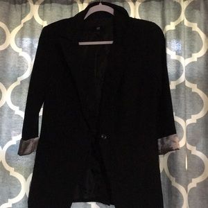 Black dresses jacket with stripes on the arms
